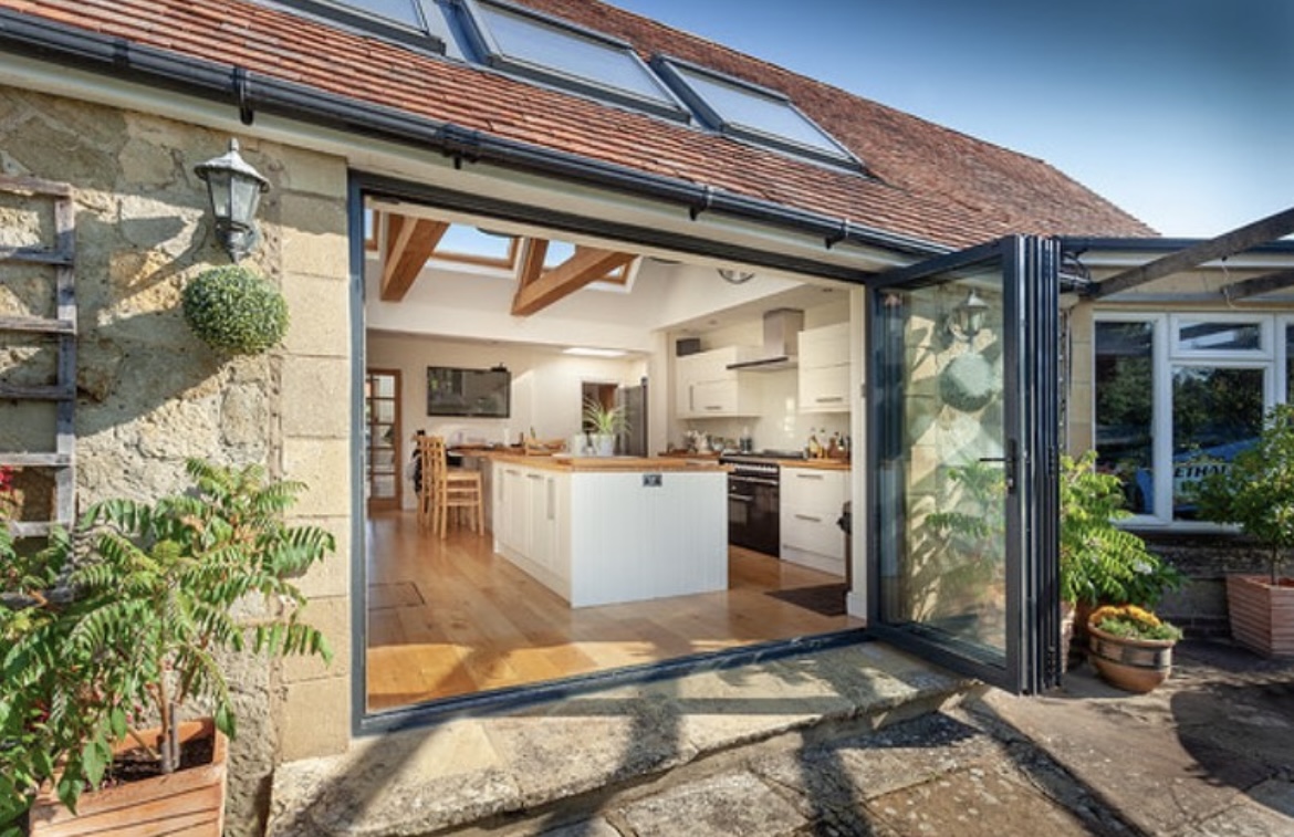 black frame aluminium bi-fold doors Worcestershire in cobble home